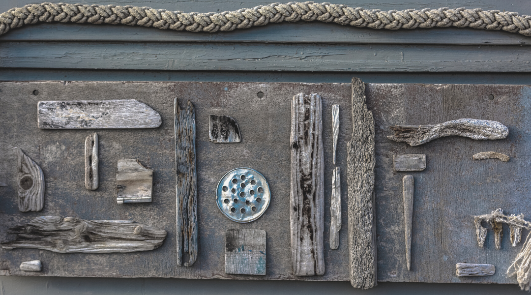 driftwood rope and metal on on wooden board